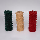 Candles with textured bead patterns