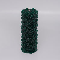Candles with textured bead patterns