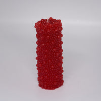 Candles with textured bead patterns